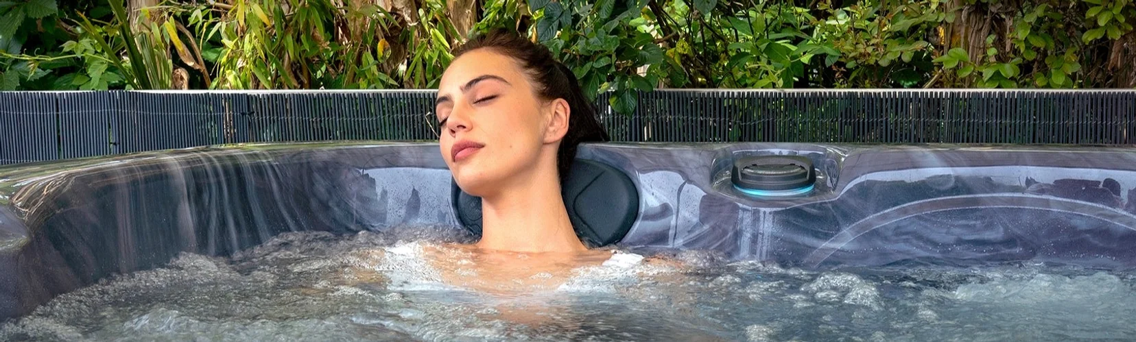 Woman enjoying Maple Spas Hot Tub Hero