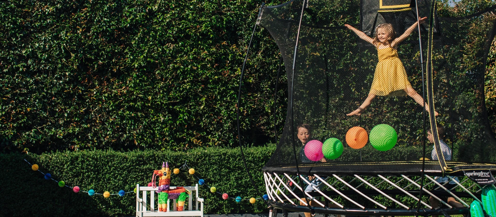 Kids Jumping Safely On a Springfree Trampoline