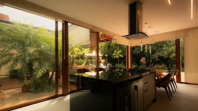 The Best Outdoor Kitchen Materials for Canadian Weather Outdoor kitchens in Canada must handle extreme temperature swings, snow, moisture, and UV exposure, so choosing the right materials is key to long-term durability. Unlike indoor spaces, outdoor surfaces are exposed year-round, making strong, weather-resistant materials essential to prevent damage and costly repairs. Canadian weather is unpredictable, with freezing winters, thaw cycles, and hot summers all putting stress on outdoor structures. This is especially true for homeowners planning outdoor kitchens in Calgary, where conditions can change quickly. Using durable materials helps extend lifespan, reduce maintenance, and keep your outdoor space functional. Why Material Choice Matters in Canadian Weather Canada’s climate is tough on outdoor structures. Freezing winters, thaw cycles, heavy snow, and summer heat can quickly damage low-quality materials. The best outdoor kitchen materials are those that resist: Cracking from freeze-thaw cycles Rust and corrosion from moisture Fading from UV exposure Warping from temperature changes If you’re planning a new project, material selection becomes even more important due to the region’s cold winters and dry summers. Best Countertop Materials for Outdoor Kitchens Countertops are one of the most exposed parts of any outdoor kitchen. They need to handle weather, food prep, and frequent use. Granite Granite is one of the most popular outdoor countertop materials. Extremely durable and weather-resistant Handles freezing and heat without cracking Naturally resistant to scratches Granite is a reliable long-term choice, especially in colder climates. Concrete Concrete offers a modern look and strong durability. Customizable in color and shape Very strong when properly sealed Can handle extreme temperatures However, it requires sealing to prevent moisture damage and cracking over time. Stainless Steel Stainless steel is commonly used in professional outdoor kitchens. Non-porous and easy to clean Resistant to heat and stains Modern, sleek appearance It can get hot in direct sunlight, but it performs well in all weather conditions. Durable Cabinet Materials That Last Cabinets are often overlooked, but they take a lot of wear from weather and storage use. Marine-Grade Polymer This is one of the best materials for outdoor cabinets. Completely waterproof Will not rot, warp, or crack Low maintenance It’s ideal for Canadian climates where moisture is a concern. Stainless Steel Cabinets Stainless steel cabinets offer both durability and a modern design. Resistant to rust (especially 304 or 316 grade) Strong and long-lasting Easy to clean They are a premium option but worth the investment for durability. Stone Veneer Over Framing Stone veneer adds both strength and visual appeal. Holds up well in freeze-thaw cycles Matches outdoor landscaping Durable when installed properly This option is often used in high-end projects. Best Flooring Materials for Outdoor Kitchens Flooring needs to be safe, slip-resistant, and able to handle weather changes. Natural Stone Natural stone is a top choice for outdoor kitchens. Extremely durable Handles temperature changes well Adds a high-end look Choose textured finishes to prevent slipping. Concrete Pavers Concrete pavers are practical and versatile. Easy to replace if damaged Resistant to cracking when installed correctly Available in many styles They are a cost-effective solution for many homeowners. Porcelain Tiles (Outdoor Rated) Outdoor-rated porcelain tiles are growing in popularity. Low water absorption Resistant to frost and stains Easy to maintain Make sure they are specifically rated for outdoor use in cold climates. Choosing the Right Appliances for Outdoor Use Outdoor kitchen appliances must be designed for exterior conditions. Indoor appliances will not last outside. Look for: Stainless steel construction Weatherproof seals CSA-approved outdoor ratings Common outdoor appliances include: Built-in grills Outdoor refrigerators Side burners Pizza ovens If you’re also considering relaxation features, many homeowners pair kitchens with hot tubs in Calgary to create a full outdoor living space. Weather Protection Features to Consider Even the best materials benefit from added protection. Pergolas and Roof Covers Adding a structure over your kitchen helps reduce direct exposure. Protects from snow and rain Reduces UV damage Extends the life of materials Wind Barriers Wind can carry moisture and debris that damage surfaces. Glass panels or screens help protect your space Improve comfort when cooking outdoors Proper Drainage Water buildup is a major cause of damage. Ensure surfaces slope away from the kitchen Use proper drainage systems Good drainage prevents freezing damage and extends material lifespan. Maintenance Tips for Long-Lasting Materials Even durable materials need basic care to stay in good condition. Clean surfaces regularly to prevent buildup Seal stone and concrete annually Cover appliances during winter Inspect for cracks or wear each season Simple maintenance can add years to your outdoor kitchen’s life. How to Choose the Best Material for Your Needs The right material depends on your budget, style, and how you plan to use your kitchen. Ask yourself: Will I use this year-round or seasonally? Do I want low maintenance or premium finishes? What style matches my home and backyard? For colder regions like Calgary, prioritize durability over appearance alone. Materials that look great but fail in winter will cost more in the long run. Outdoor Kitchens Calgary: What Works Best Locally In Calgary, the best outdoor kitchen materials are those that handle extreme cold and dry conditions. Top local recommendations include: Granite or concrete countertops Stainless steel or polymer cabinets Stone or paver flooring These materials consistently perform well in Alberta’s climate. Many homeowners also integrate features like fire pits or tubs to maximize outdoor use even during cooler months. Frequently Asked Questions 1. What is the most durable material for outdoor kitchen countertops? Granite is one of the most durable options. It resists heat, cold, and moisture, making it ideal for Canadian climates. 2. Can outdoor kitchens survive Canadian winters? Yes, outdoor kitchens can handle winter if built with weather-resistant materials and proper installation techniques. 3. What cabinets are best for outdoor kitchens? Marine-grade polymer and stainless steel cabinets are the best choices because they resist moisture, rust, and temperature changes. 4. Do outdoor kitchens need to be covered? Covering an outdoor kitchen is not required, but it helps protect materials and extend their lifespan, especially in harsh weather. 5. Are outdoor kitchens worth the investment in Canada? Yes, outdoor kitchens add usable living space and increase property value, especially when built with durable, weather-resistant materials.